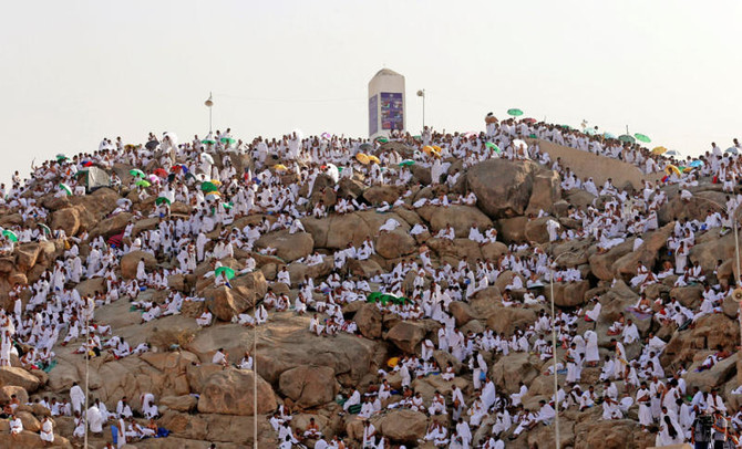 On June 27, 2023, pilgrims brave the heat to ascend Mount Arafat for the Hajj