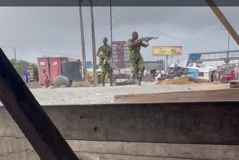 In Lagos, a man is killed when soldiers and locals fight.