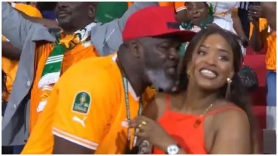 AFCON: Ivorian fan apologises to family after caught wooing lady during Senegal game